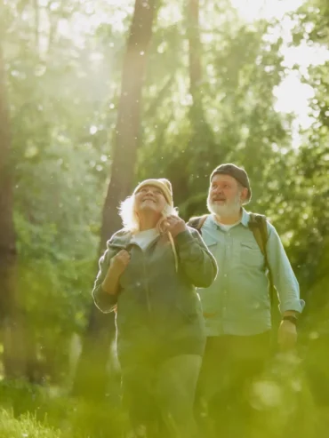 Senior,Couple,,Man,And,Woman,Taking,Peaceful,Walk,In,Park,